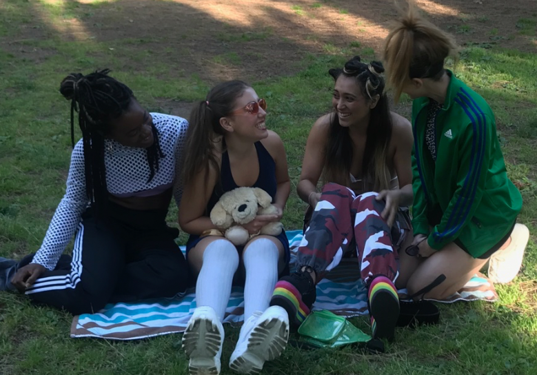 Aggs Chloe T Lottie and Frankie sitting on the grass