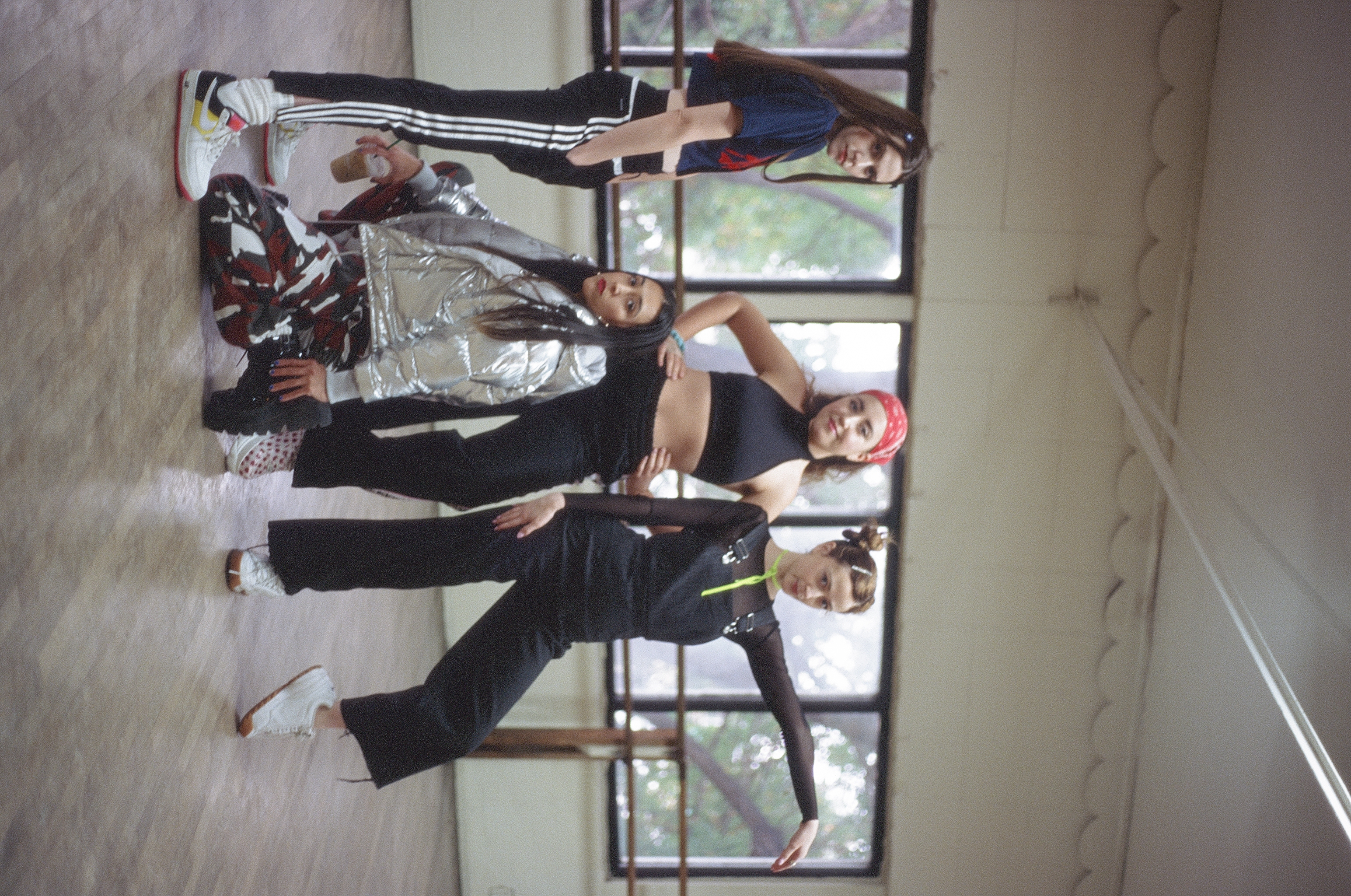 Frankie Sofia Lottie and Chloe T posing in the dance studio